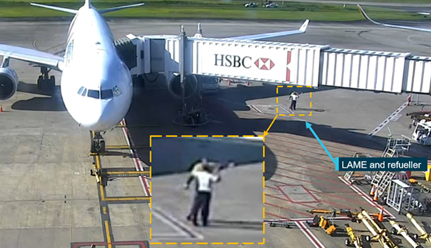 Figure 2: Security footage of the refueler pointing towards SQ256 and informing the LAME that the pitot covers were fitted