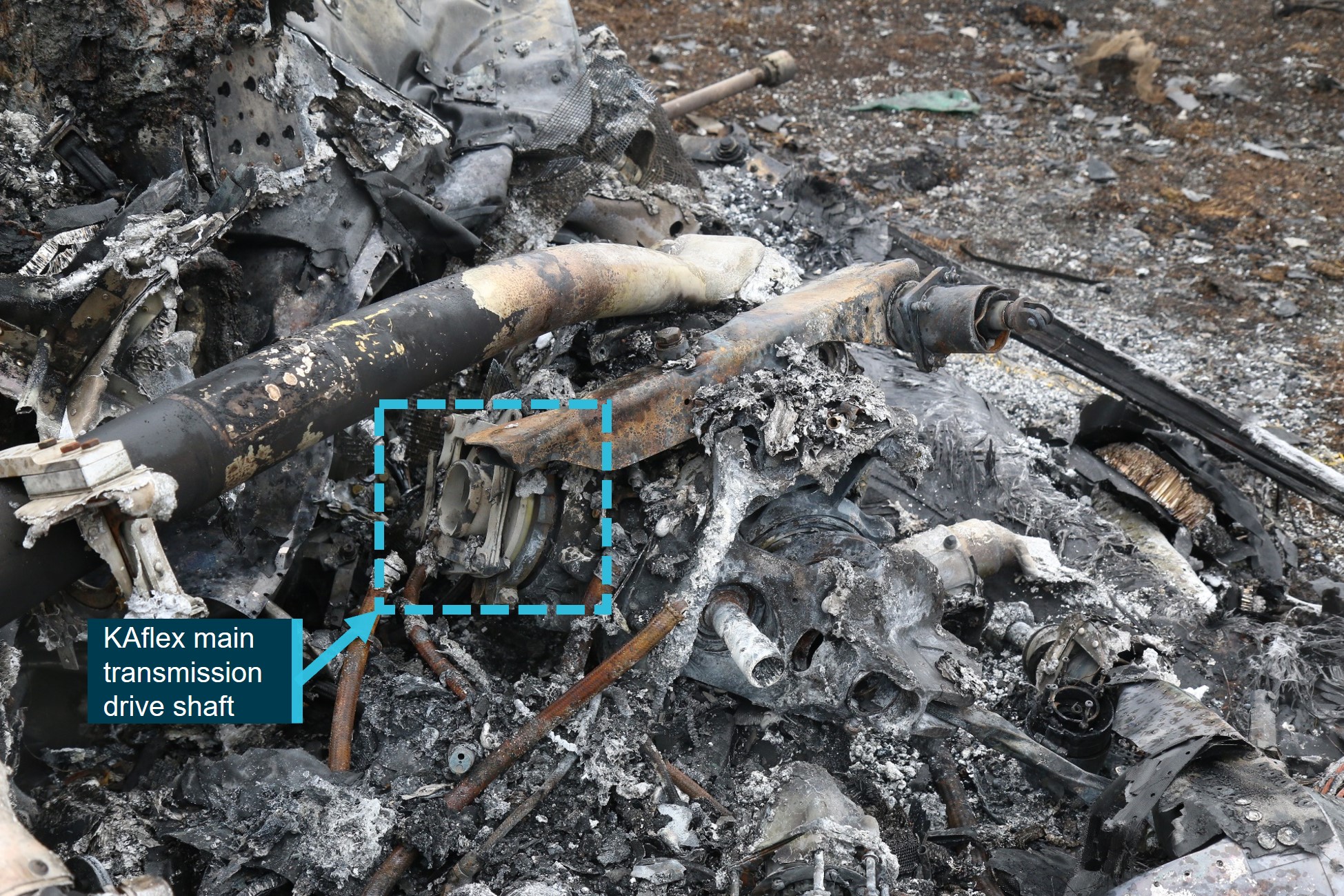 Figure 10: Burnt wreckage noting the forward section of the fragmented KAflex main transmission drive shaft