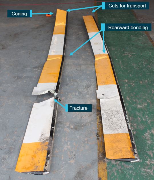 Figure 16: VH-IDW’s main rotor blades showing rearward bending and fracture