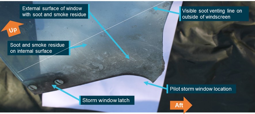 Figure 9: Smoke and soot indications on window surfaces adjoining the pilots storm window