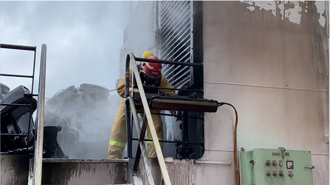 Figure 6: AAD volunteer firefighter checking ventilation louvres