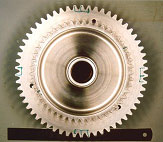 Figure 18. Starter gear, showing four localised areas of pitting around the diameter.