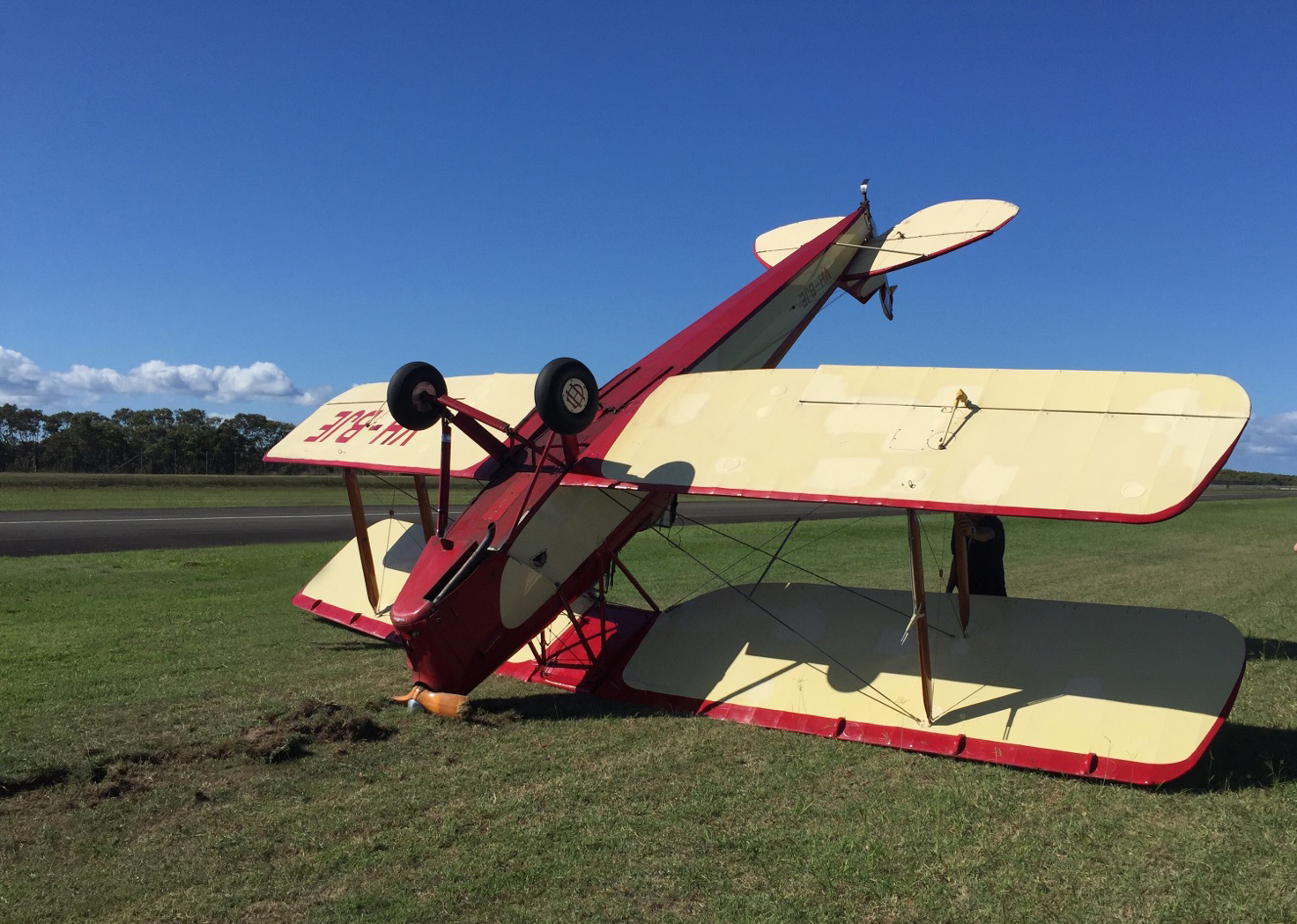 Accident site showing damage to VH-BJE