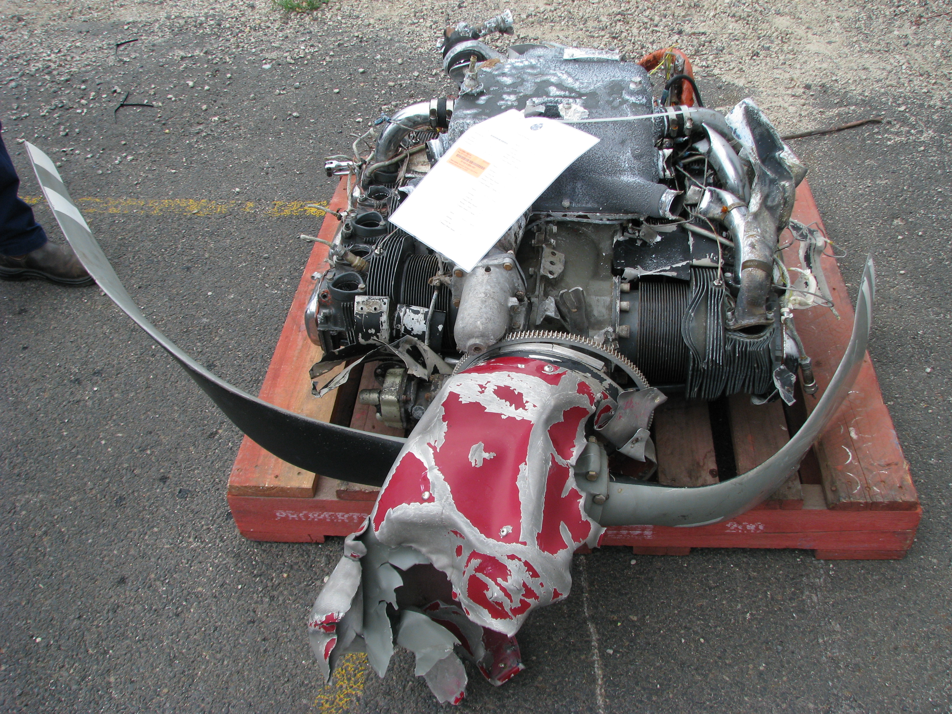 Figure 8: Recovered aircraft engine, propeller and propeller spinner, looking at the lower surface of the engine