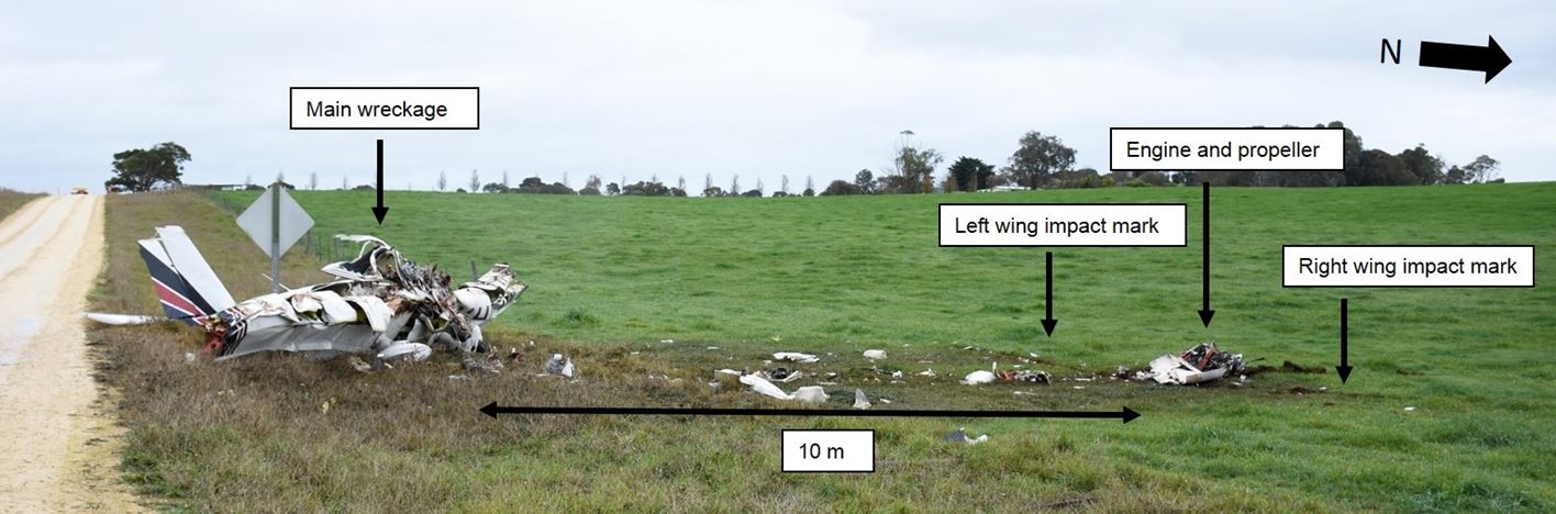 Figure 3: Accident site looking north-west, showing the engine and propeller location alongside the left and right wing impact marks, about 10 m from the main wreckage, which is upright and facing in a north-north-easterly direction