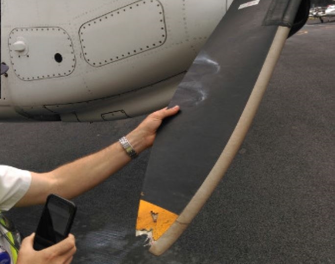 Figure 2: Left engine propeller showing damaged blade tip on arrival at Merimbula. Source: Regional Express