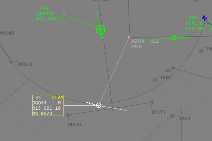 Figure 1: Image of air traffic controller’s monitoring screen showing CLAM alarm activation following the aircraft’s descent below 2,100 ft.<br />
Image shows the aircraft (JG044) with a current altitude of 1,500 ft (‘015’), a cleared altitude of 2,100 ft (‘021’), a radar vectored heading of 070° (‘H070’) and a groundspeed of 160 kt (‘16’). Source: Airservices Australia