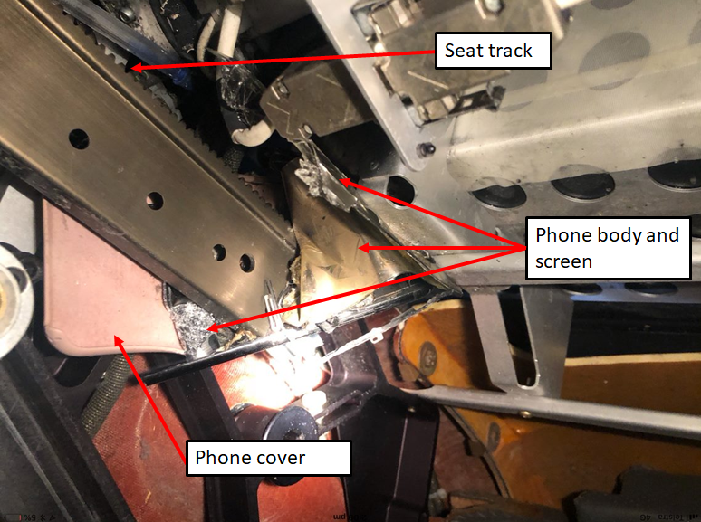 Figure 1. Crushed PED in the seat track