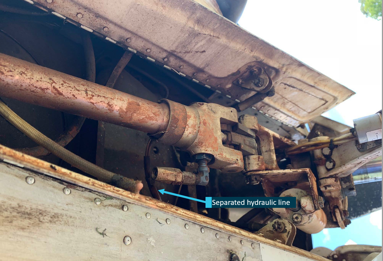 Figure 2: Broken hydraulic line from nose wheel actuator. Source: Operator