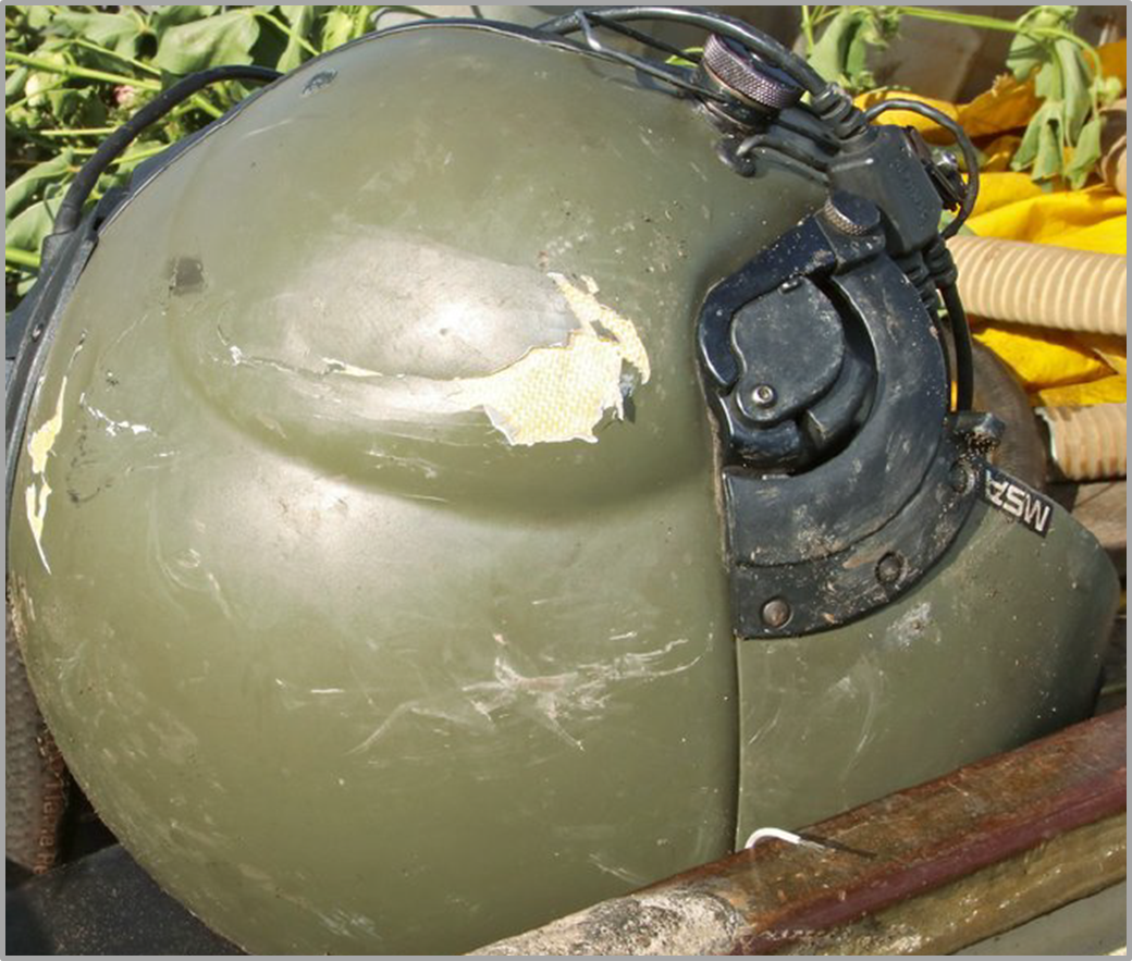 Figure 3: Damage to the left side of the pilot’s flight helmet. Source: Police