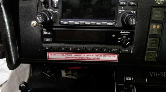 Figure 3: VH-SEV instrument panel showing decal with speed avoidance range.<br />
Source: Rotor Head