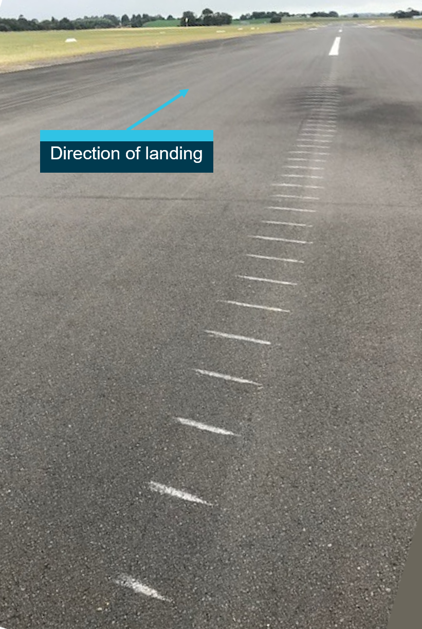 Figure 2: Left propeller strike marks.<br />
Source: Airport operator, annotated by ATSB.