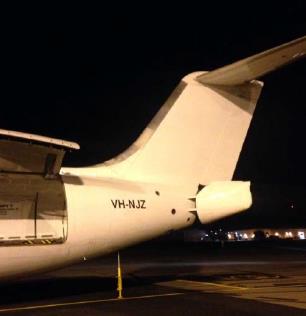 Figure 1: Example of a tail strut fitted to NJZ and showing opened freight door.<br />
Source: Cobham Aviation Services Australia