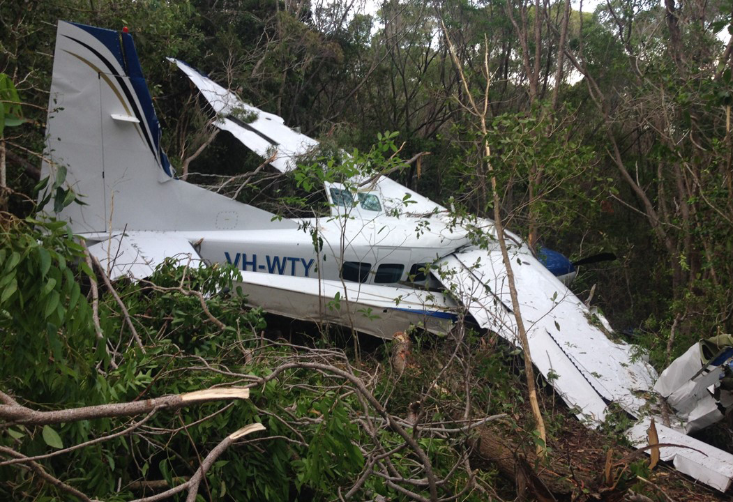 Figure 5: VH-WTY wreckage, located in dense foliage    Source: Gordon Simmons