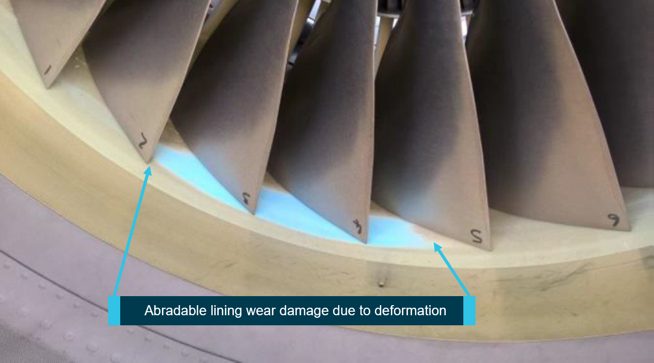 The blue area shows where the rotating engine blades have contacted the abradable lining.<br />
Source:  Operator’s investigation report, annotated by the ATSB.