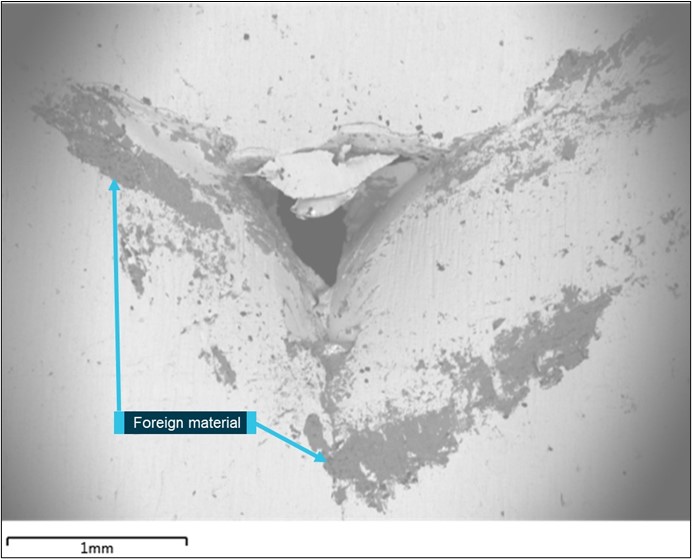 Backscattered electron image of the hydraulic line damage