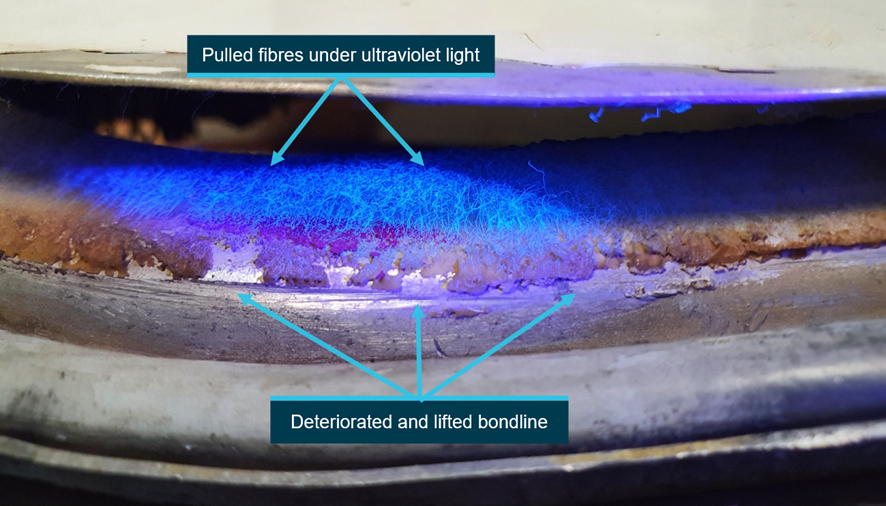 Figure 5: Deteriorated and failed bondline of the emergency exit door