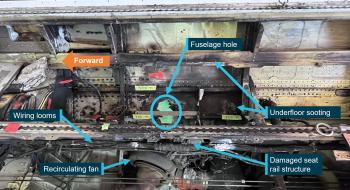 Underfloor fire damage showing fuselage hole