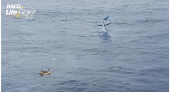 The pilots awaiting rescue in their inflated life raft. Source: RACQ LifeFlight Rescue