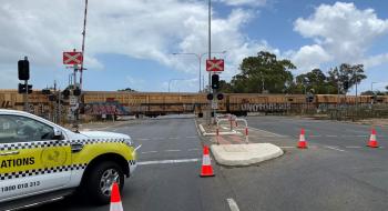 Train 1MP9 blocking the Torrens Road level crossing after the incident.