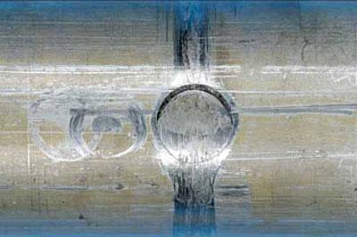 Figure 4: Fractured through-pin from the forward coupling.  Note also the scoring from post-fracture rotation of the shaft