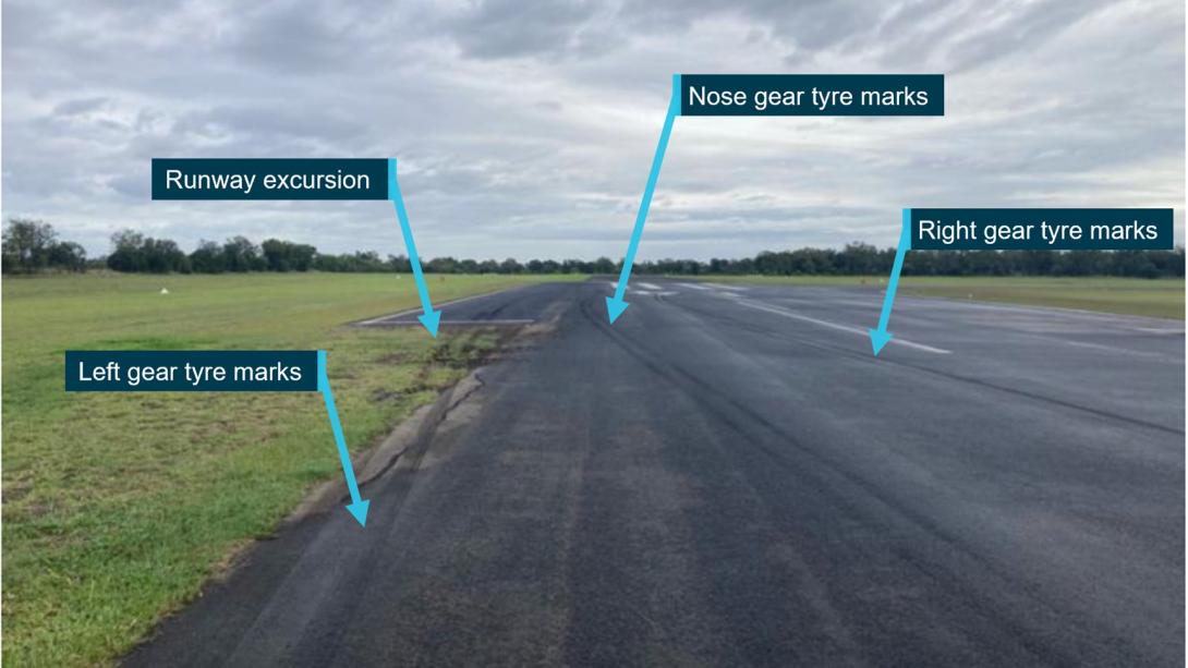 Tyre marks showing runway excursion to the left of runway