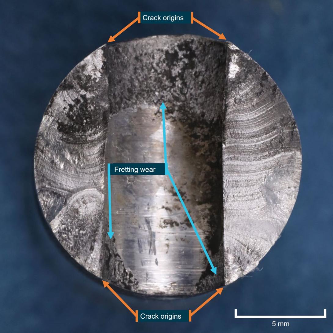 Figure 5: Rudder shaft fatigue fracture surfaces, and bolt hole exhibiting fretting wear